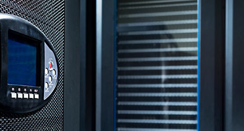 Backup security under a digital lock in a server room.